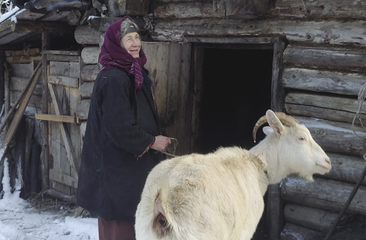 Woman with goat.