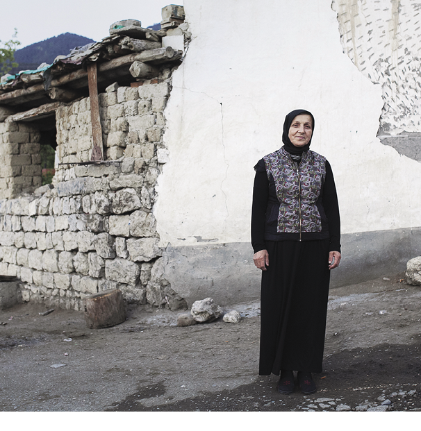 Woman standing in street.