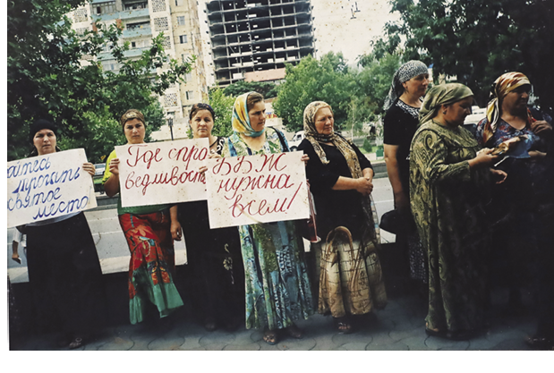 Women demonstrating with placards.
