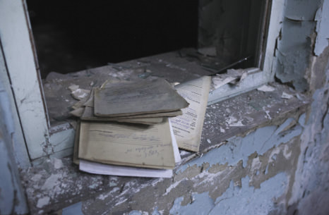 Medical charts on a windowsill.