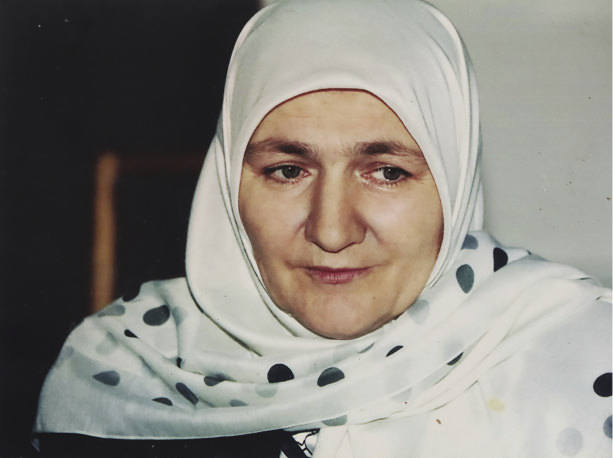 Woman in white headscarf