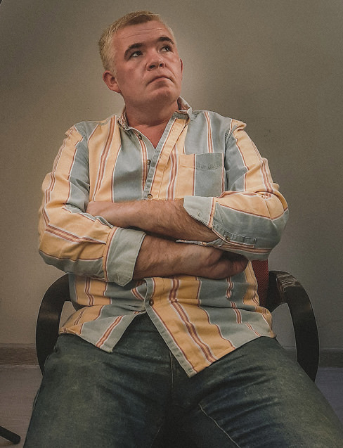 Man sitting in a chair.