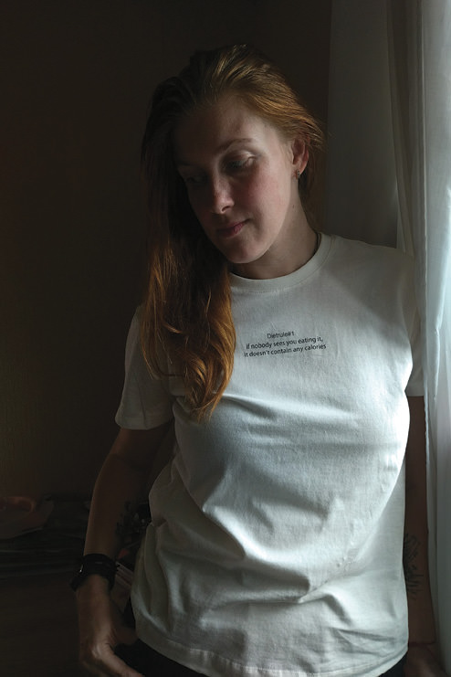 Woman standing by a window