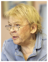 Woman looking camera left.