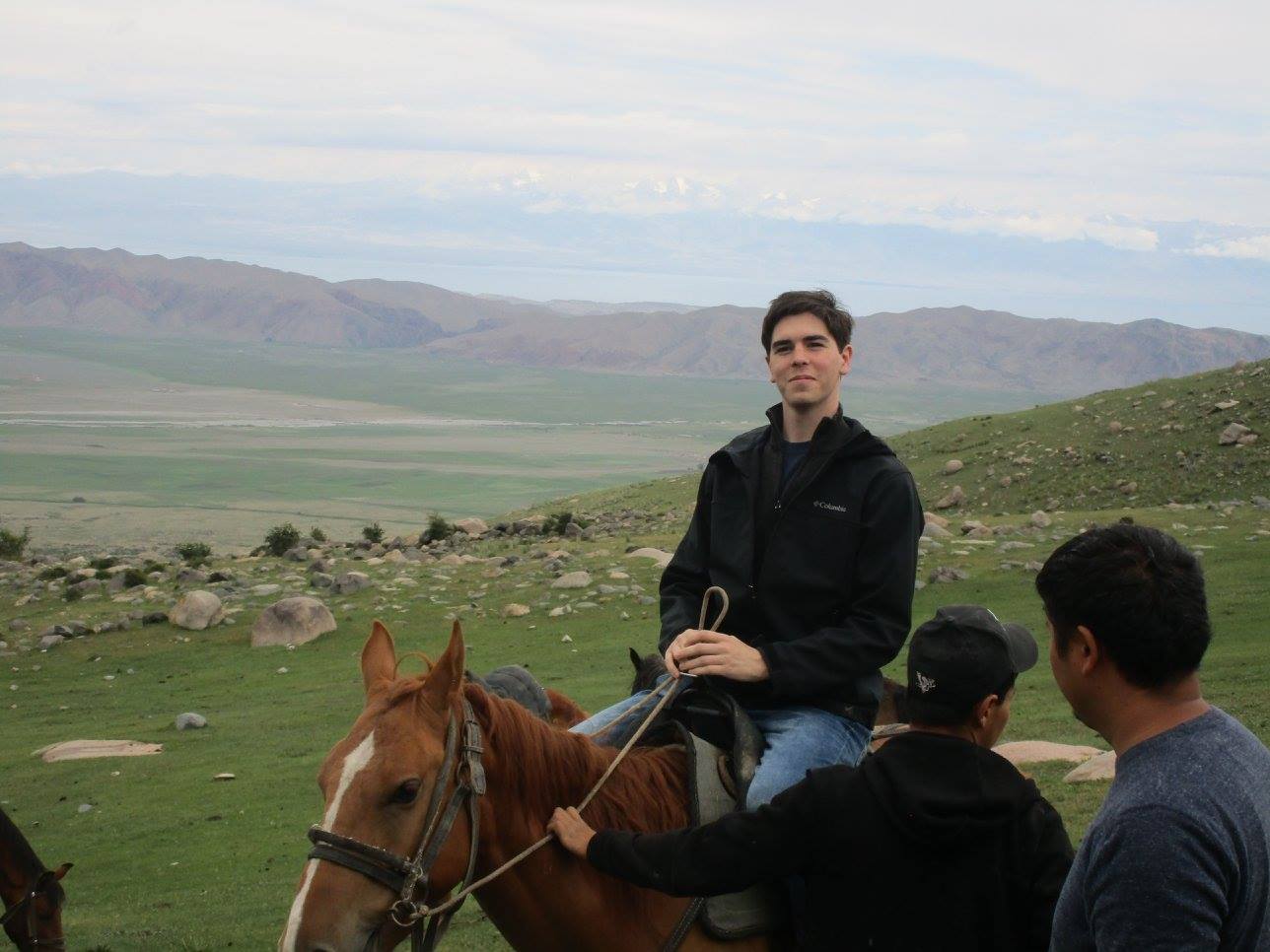 American student horseback riding in Kyrgyzstan