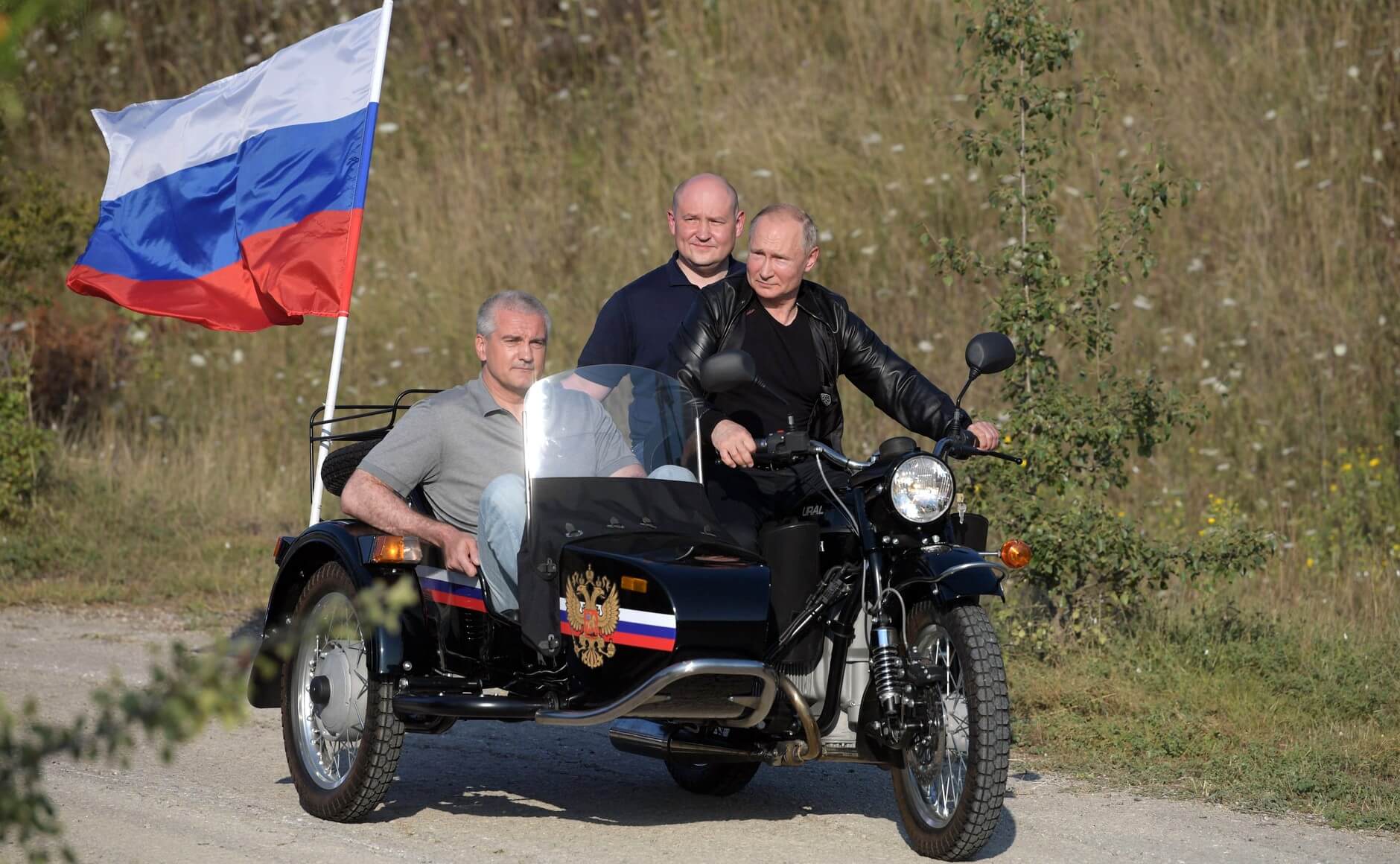 Putin on a motorcycle without a helmet