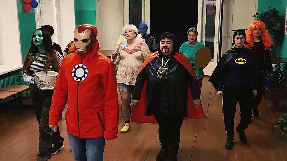 Teachers in Avengers costume