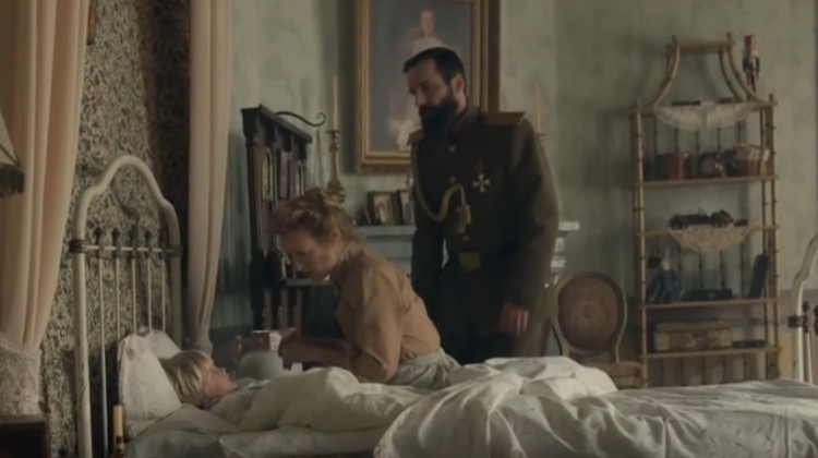 Nicholas and Alexandra at Alexei's bedside in The Last Czars