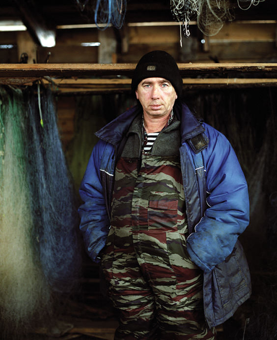 Man in fishing outfit