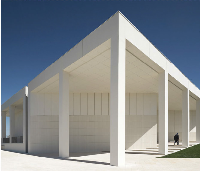 White building against blue sky