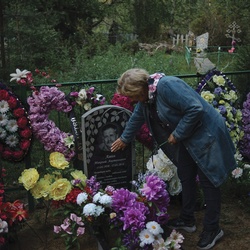 Lyudmila at Nikolai's grave