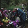 Lyudmila at Nikolai's grave