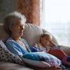 Yevgenia resting with her granddaughter Vika.