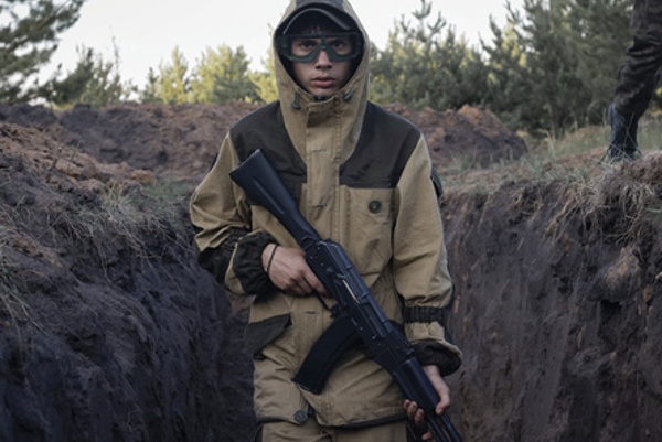 Campers learn to storm trenches they have built themselves.<br>