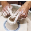 Throwing a pot.<br>