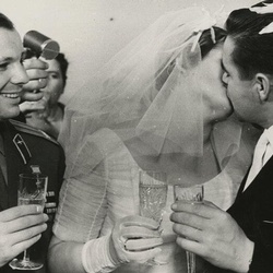 1963 photo of Tereshkova and Nikolayev kissing at their wedding.