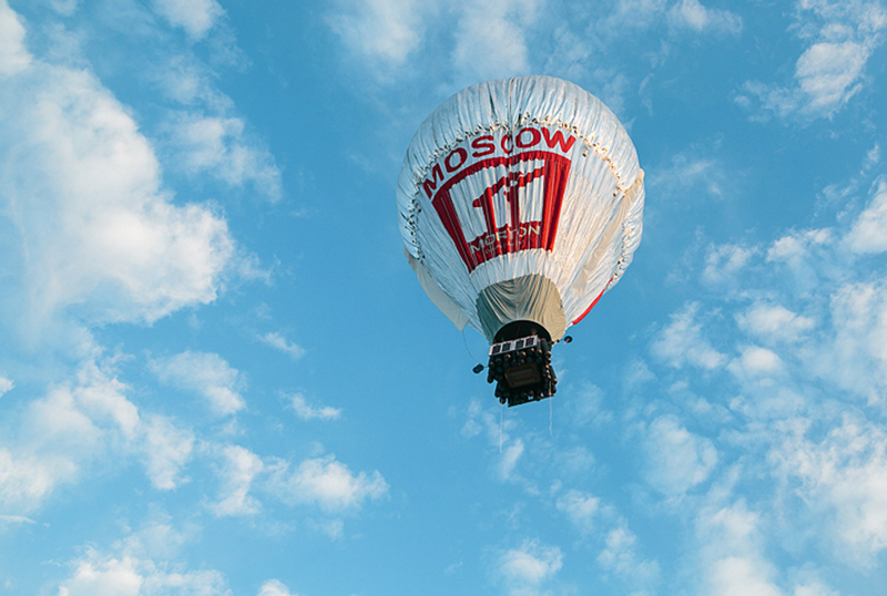 Ballooning of strict laws, and ballooning of a hot air balloon
