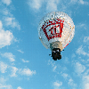 Ballooning of strict laws, and ballooning of a hot air balloon