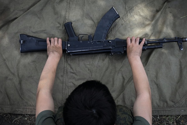 Learning to assemble a gun.<br>